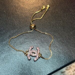 AUTHENTIC CHANEL STAMPED pink rhinestone GOLD TONE ZIPPER PULL BRACELET